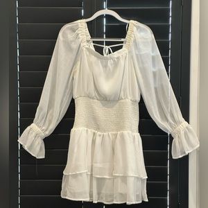 White dress with mesh sleeves. Size medium from the clothing company.